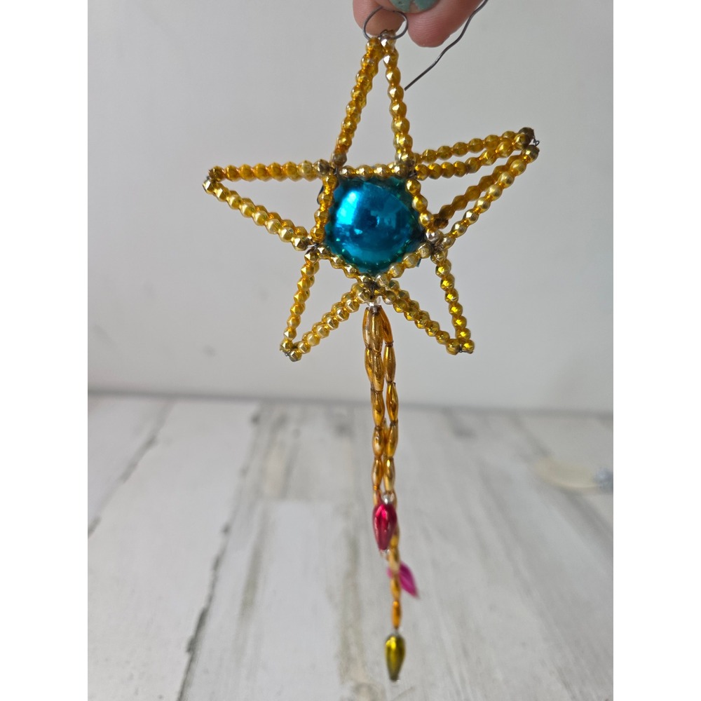 Vintage beaded star mercury glass ornament shooting Xmas tree